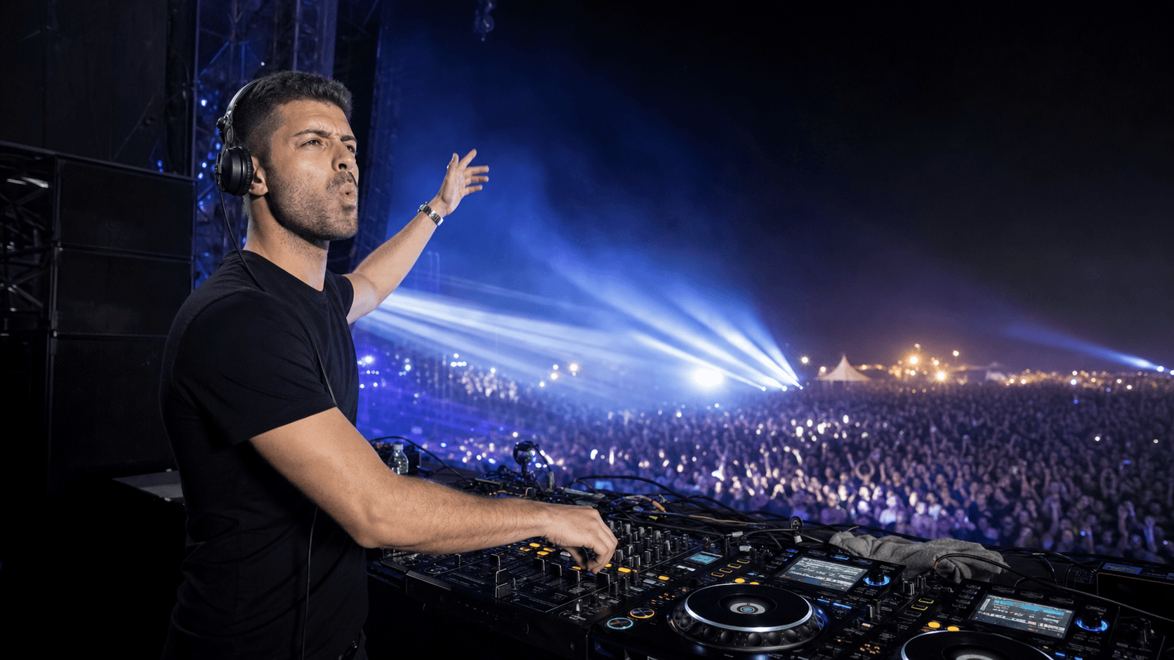 MIDOC performing live at a nighttime electronic music festival